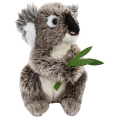 Plush koala bear with grey and white fur, holding a green leaf, set against a plain white background.