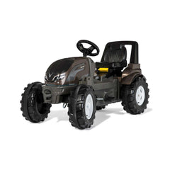 ROLLEY TOYS rollyFarmtrac Premium II Valtra is a black riding toy with yellow accents, designed for outdoor use.