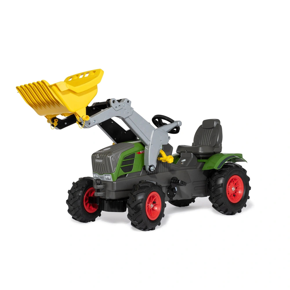 green and gray toy tractor with a yellow bucket attachment and inflatable wheels, set against a light background.