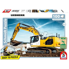 Liebherr crawler excavator puzzle packaging features a yellow and white construction vehicle set against a blue sky backgroun