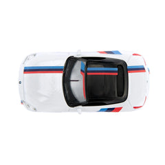 Siku BMW Z4 M40i in white with blue and red stripes, featuring an open trunk and glossy finish.