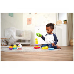 Simba ABC Stacking Ring Pyramid in a bright play area with a child exploring colorful toys on the wooden floor.