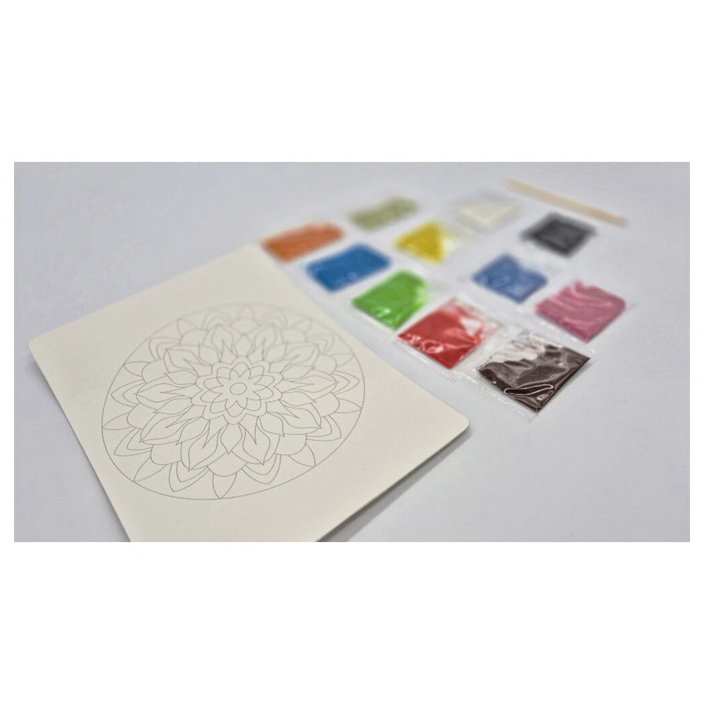 Sand Art Mandala set displayed on a light-colored surface with colorful square sand containers arranged in a grid.