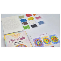 Sand art mandala project features vibrant colors and floral patterns on paper, accompanied by a palette of craft colors.