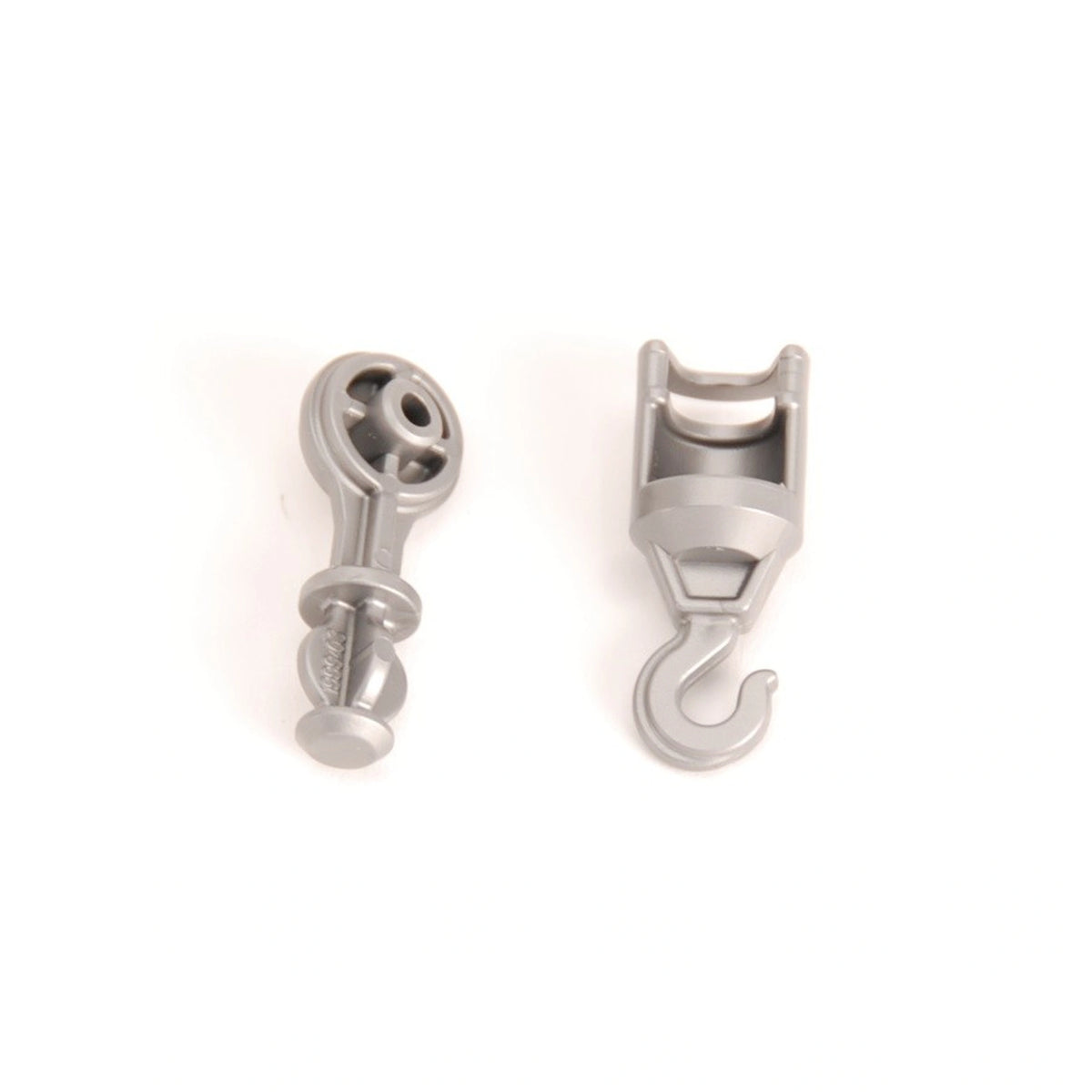Gray plastic adapter and hook set for Bruder crane toys, shown against a white background.