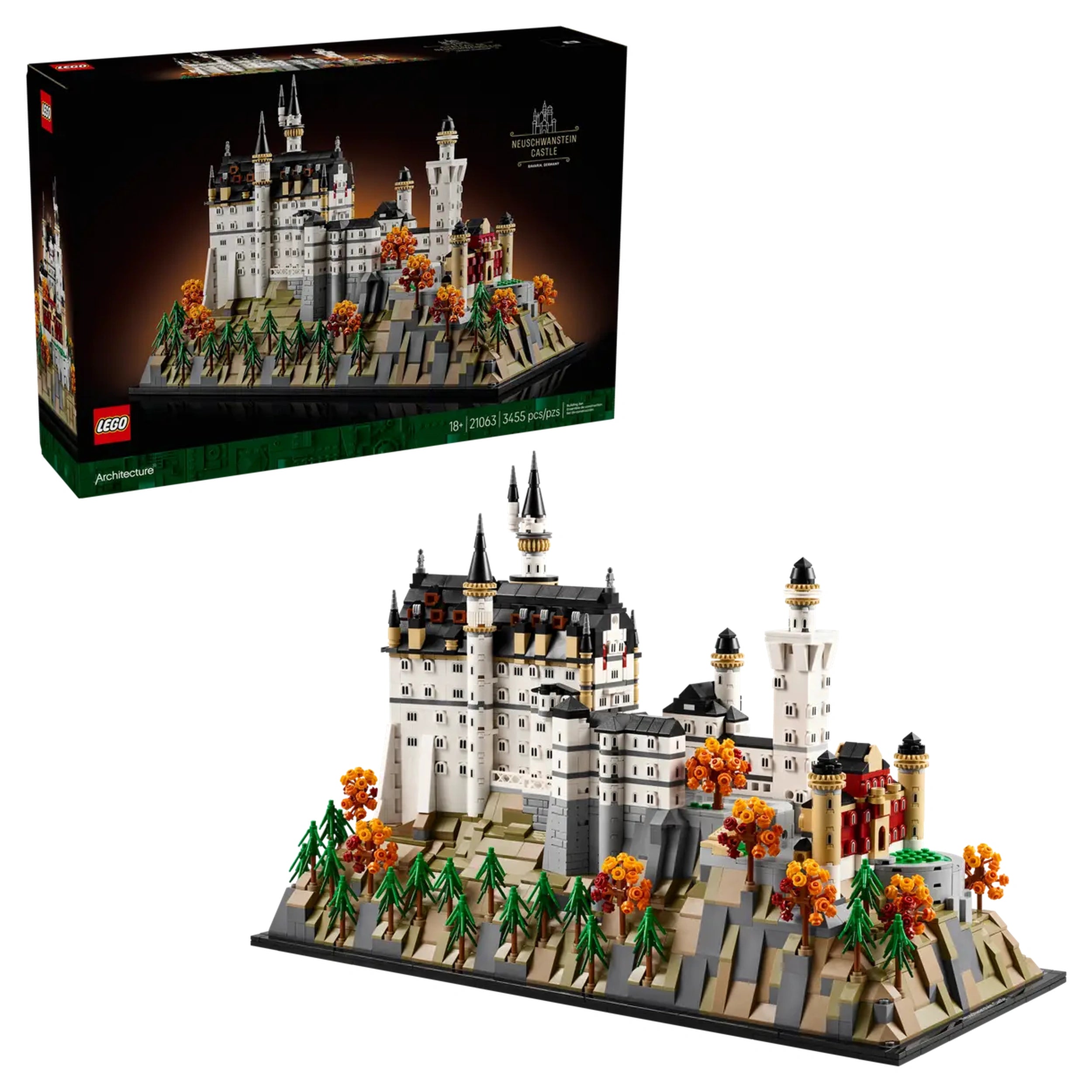 LEGO Architecture Neuschwanstein Castle model, featuring intricate details including spires and turrets, set against autumnal foliage.