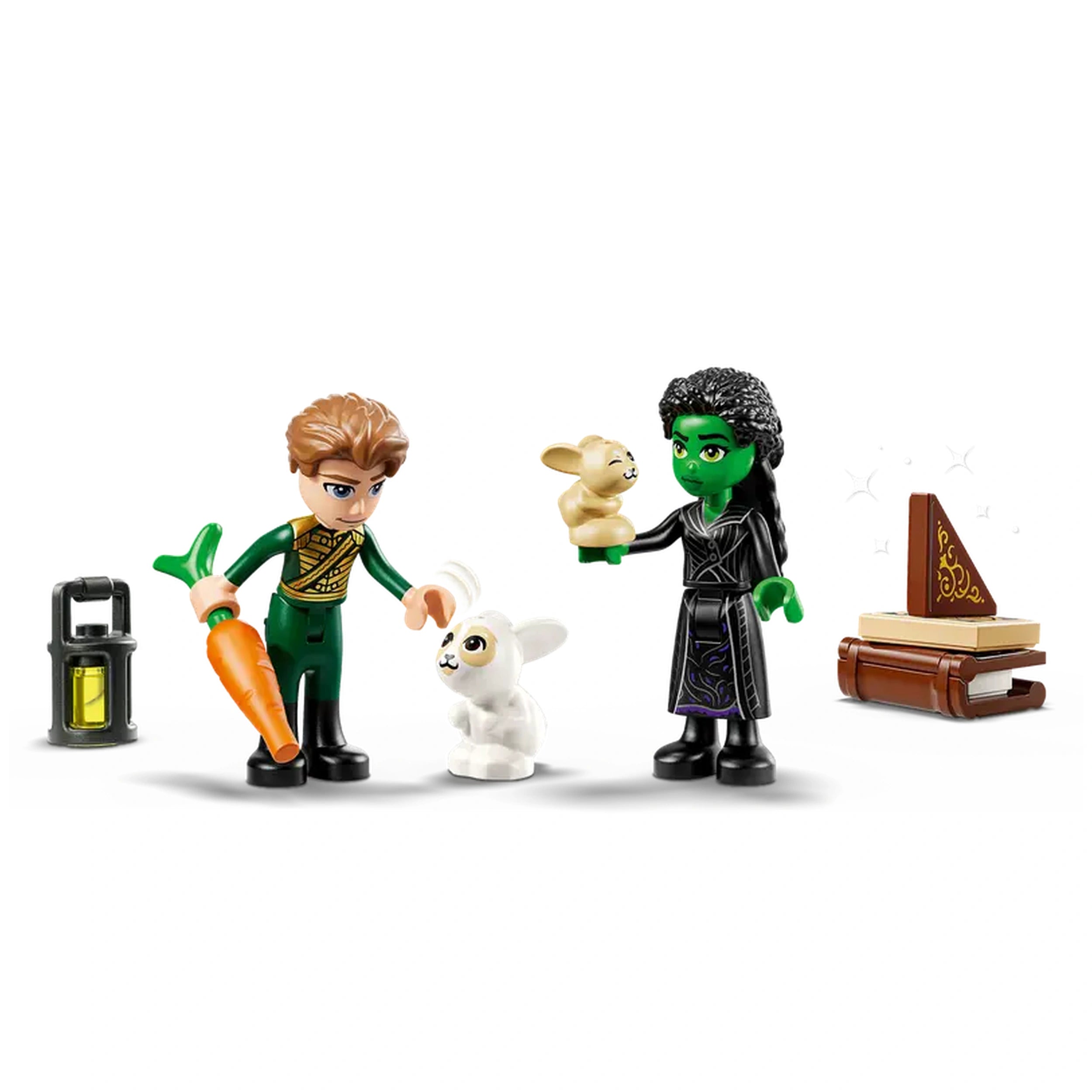 Two LEGO figures interact in a whimsical setting; one holds a carrot, the other a golden bunny. A white bunny stands beside them, with a lantern and books in the background.