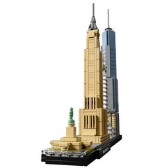 LEGO Architecture set featuring iconic New York City landmarks, including the Empire State Building and the Statue of Liberty, intricately designed and displayed on a black base.