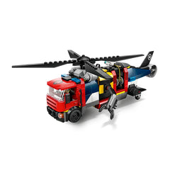 Colorful LEGO® City helicopter with spinning rotors, featuring a red and blue design, and equipped with a posable claw arm for rescue missions.