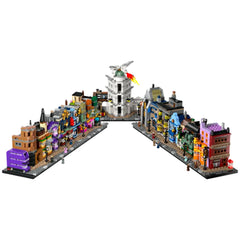 Colorful microscale model of Diagon Alley featuring intricate shops like Weasleys' Wizard Wheezes and Ollivanders, with a detailed central building.