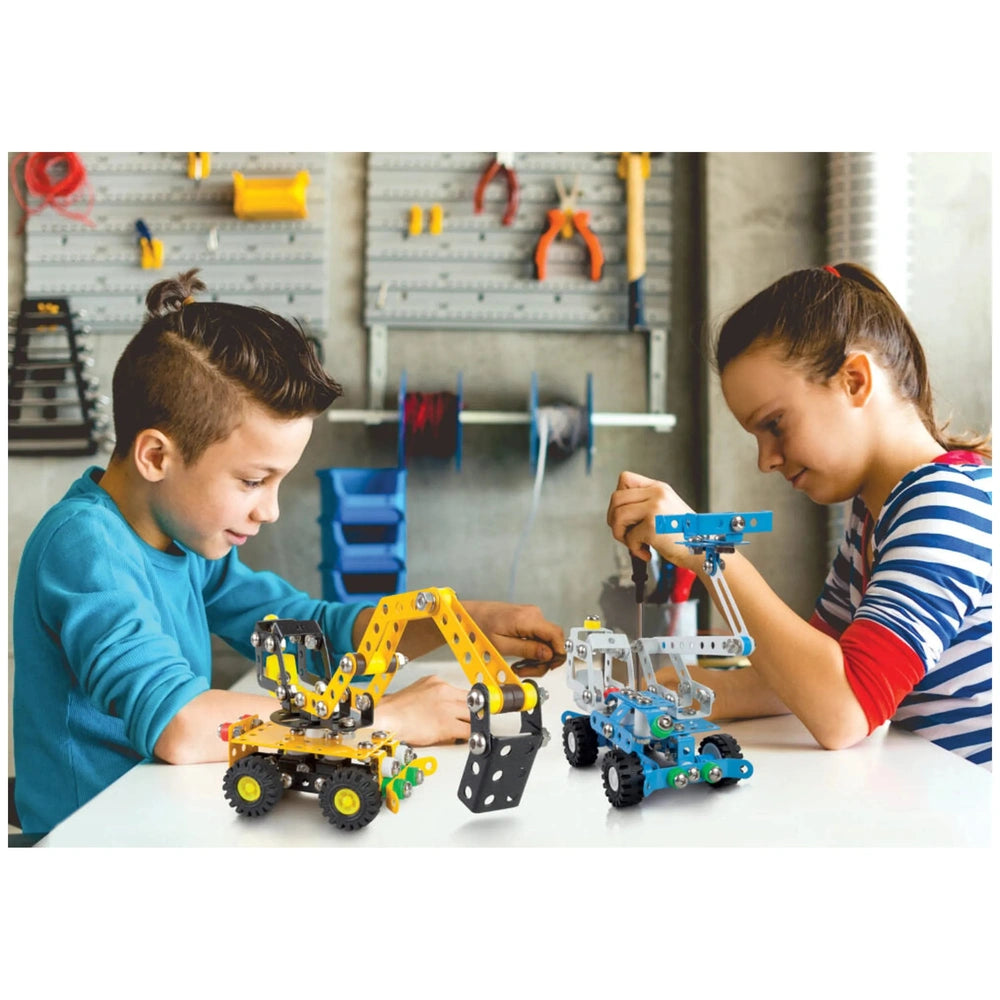Children assembling the Alexander Excavator Construction Set with yellow and blue metal parts in a workshop setting.