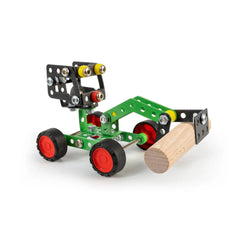 Green and black metal construction toy with red wheels and a wooden cylinder, part of the Maly Constructor series.