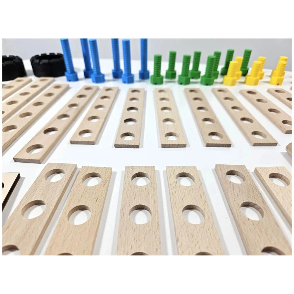 Wooden boards with holes, colorful screws in blue, green, yellow from the Alexander Race Car Construction Set on white background.