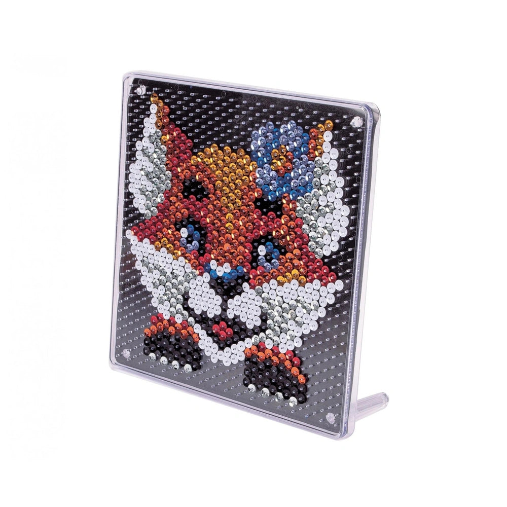 A decorative fox object featuring a colorful beaded design with a smooth, reflective surface and rounded rectangular shape.