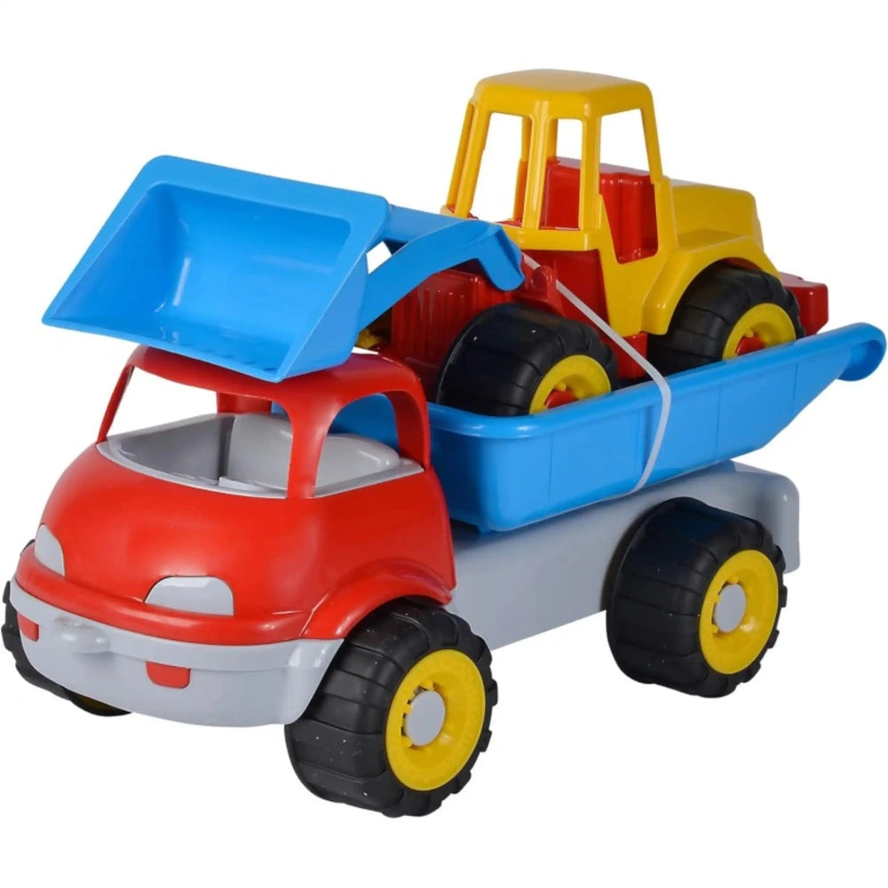 Red and gray earthmoving truck carrying a yellow and red bulldozer with a blue scoop, both on black wheels.