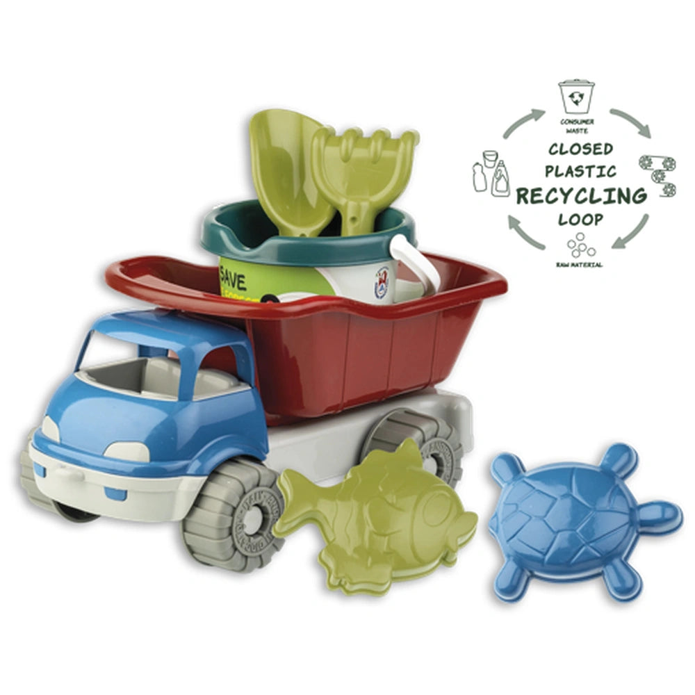 Blue and red toy truck with a green rake, spade, and bucket, accompanied by fish and turtle sand molds, pirates theme.