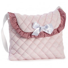 Quilted pink bag with white stars, ruffled trim, and a white bow, designed for an umbrella doll stroller.