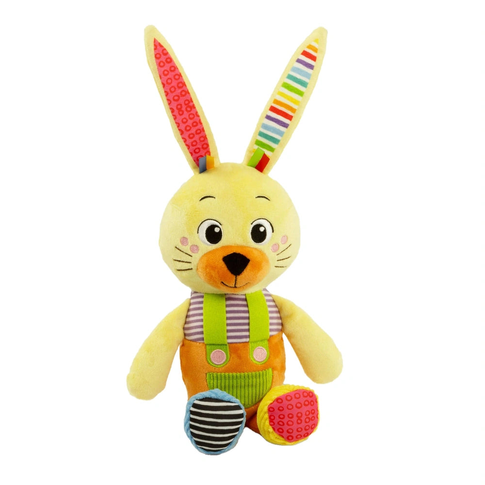 Benny the Puppy is a plush rabbit with a yellow body, orange ears, and dressed in a green vest and blue apron.