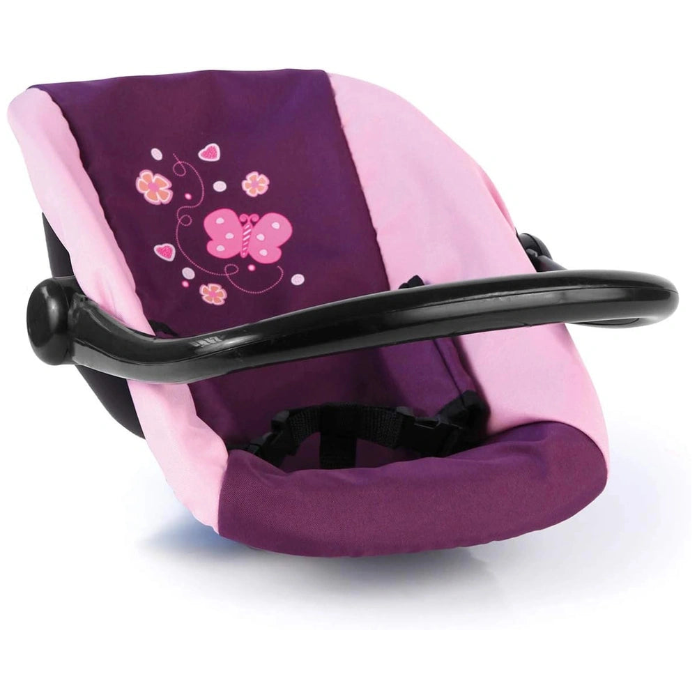 BAYER DESIGN doll car seat in pink and purple fabric with black handle and frame, featuring a harness and footrest.