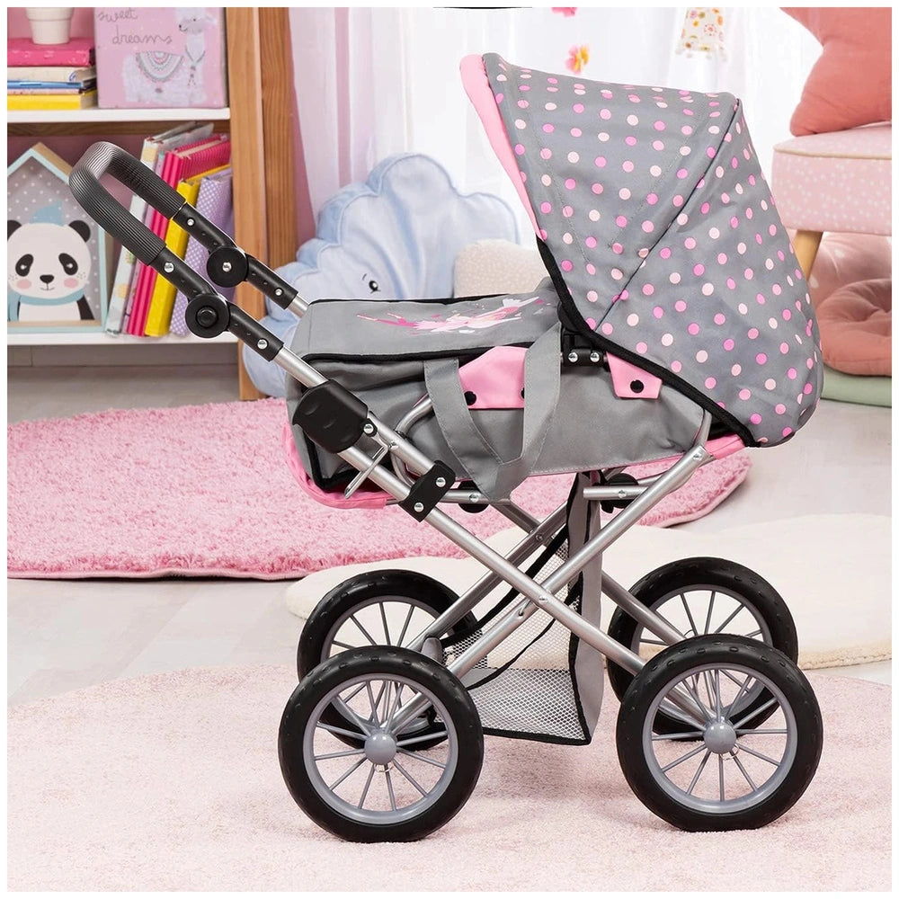BAYER DESIGN Dolls Pram City Star in pink polka dots with gray seat, black wheels, and features like canopy and storage compa