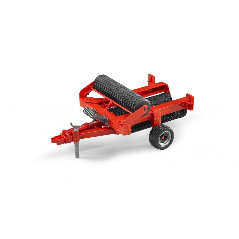 Red Bruder Cambridge Roller toy with black rollers and wheels, featuring a metal frame and realistic farming details.