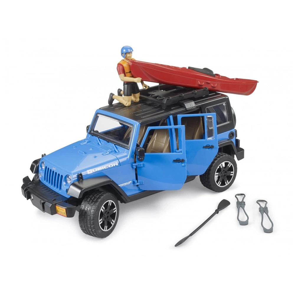 Blue Jeep Wrangler Rubicon toy with open doors, a red kayak and kayaker figure on top, and accessories nearby.