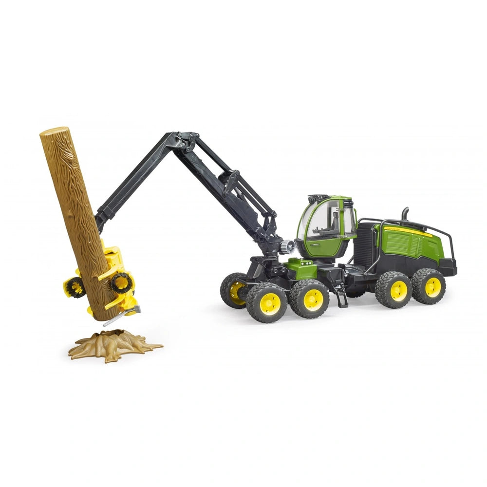 Bruder John Deere 1270G Harvester toy with rotating cabin lifts a tree trunk, featuring realistic details and vibrant colors.