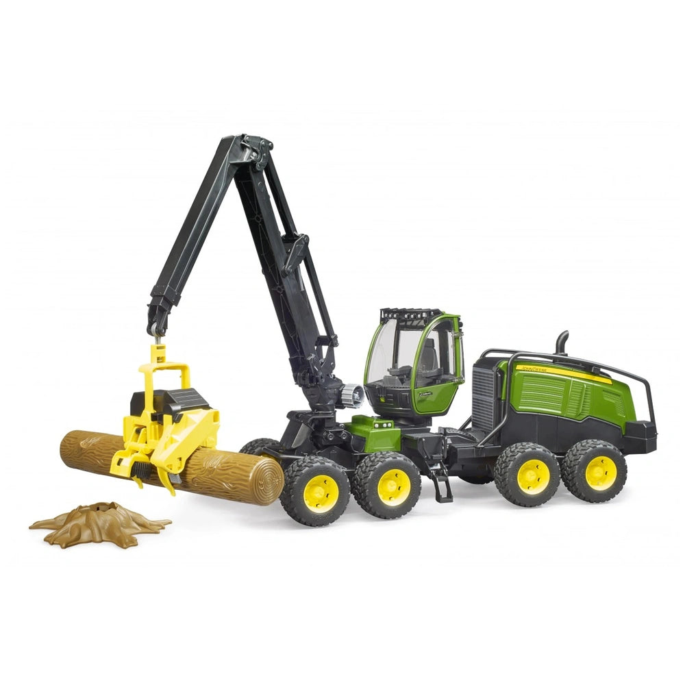 Bruder John Deere 1270G Harvester toy with rotating cabin, black crane arm lifting a tree trunk.