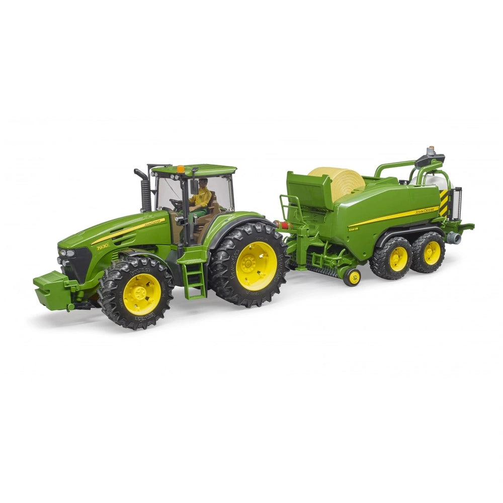 Green and yellow Bruder John Deere C441R toy model with tractor and round bales press attachment.