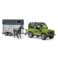 Green Land Rover Defender toy with horse trailer, black horse figure beside, showcasing realistic detail and play features.