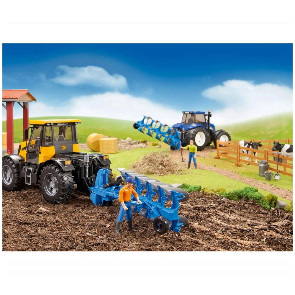 Toy farm scene with two tractors, yellow and blue, in a field with figures and cows in a fenced area.