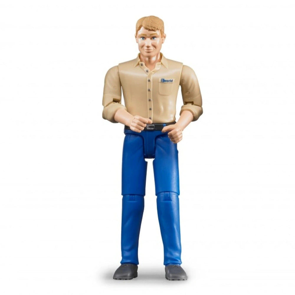 Blonde action figure in beige shirt and blue jeans, standing with hands on hips, wearing black shoes.
