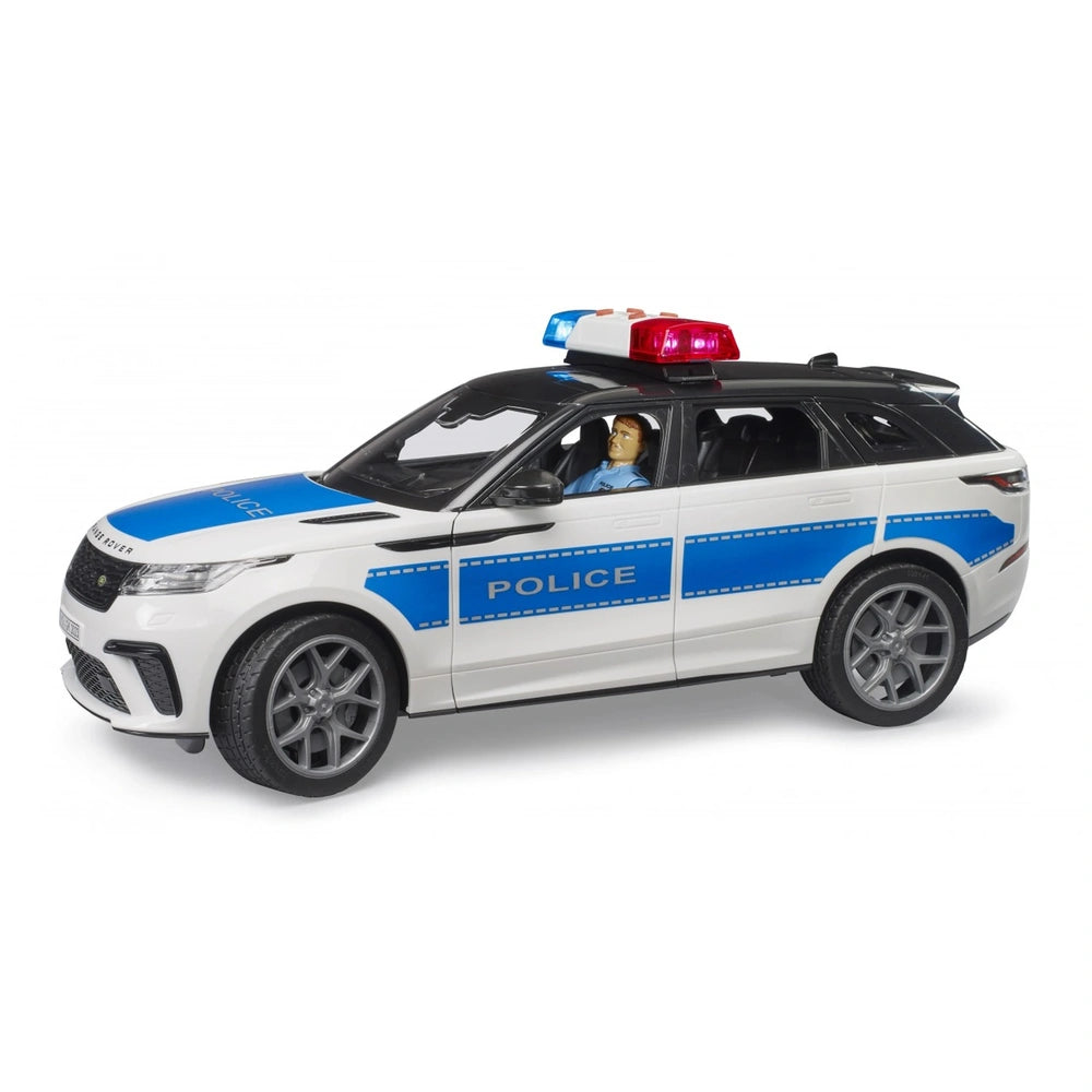 Bruder Range Rover Velar police toy with officer, white and blue, sleek design, scale 1:16, realistic features.