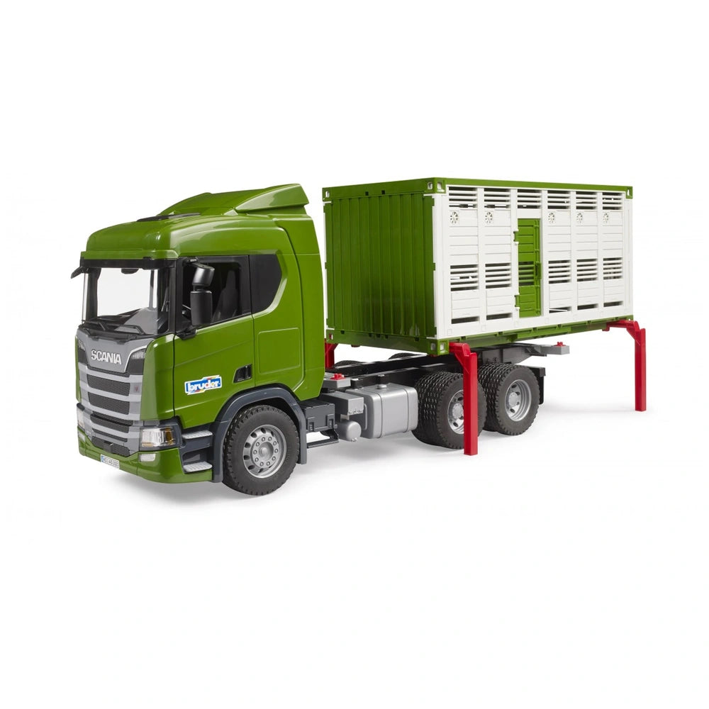 Green Bruder Scania 560R cattle transport truck model with white cargo container and red supports.