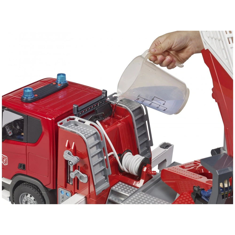 Hand pouring water into red Bruder Scania fire engine toy with visible hose and ladder.