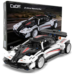 CaDA Z-Wind Sports Car construction set features a glossy white and black body with red stripe, matte black wheels, and trans