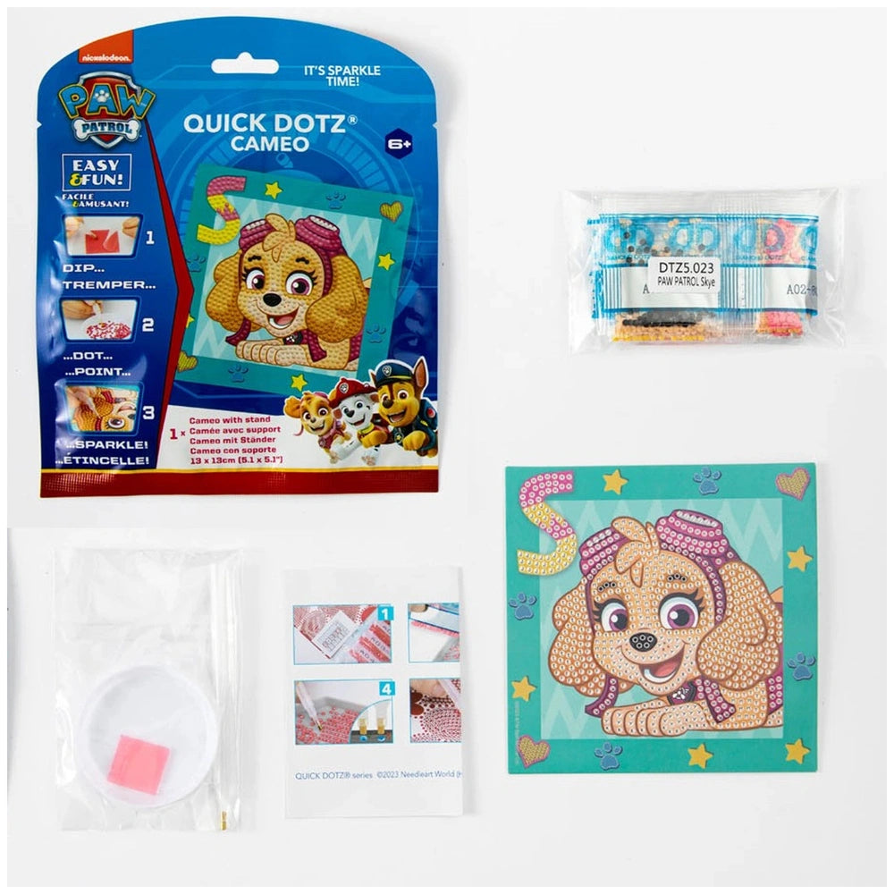 DIAMOND DOTZ DOTZIES PAW PATROL Skye diamond painting kit in blue packaging with stickers and colorful labels.