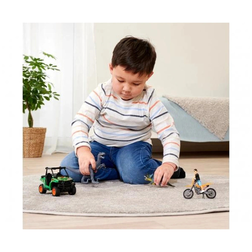 Dino Tracker Explorer Toy Playsets with a boy, toy dinosaur, motorcycle, and potted plant in a cozy living room setting.