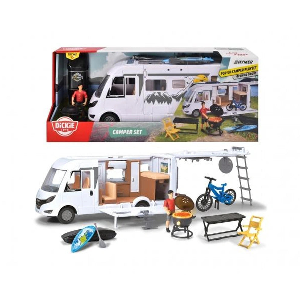 Dickie Hymer Camper Pop Up Set features a colorful toy camper, truck, and accessories in a red and white cardboard box.