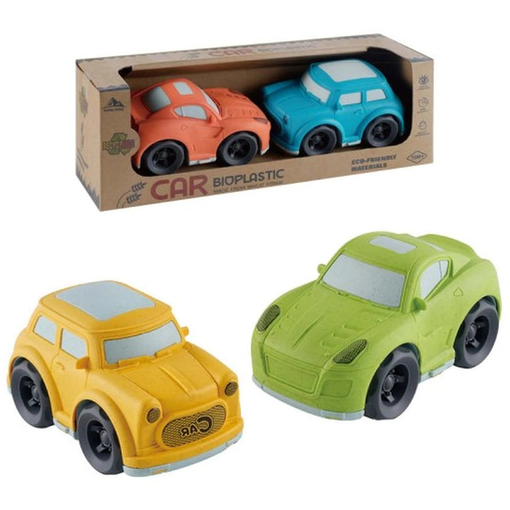 Sustainable wheat straw toy cars in yellow, orange, and green, displayed in an open box labeled "ECO-FRIENDLY MATERIALS."