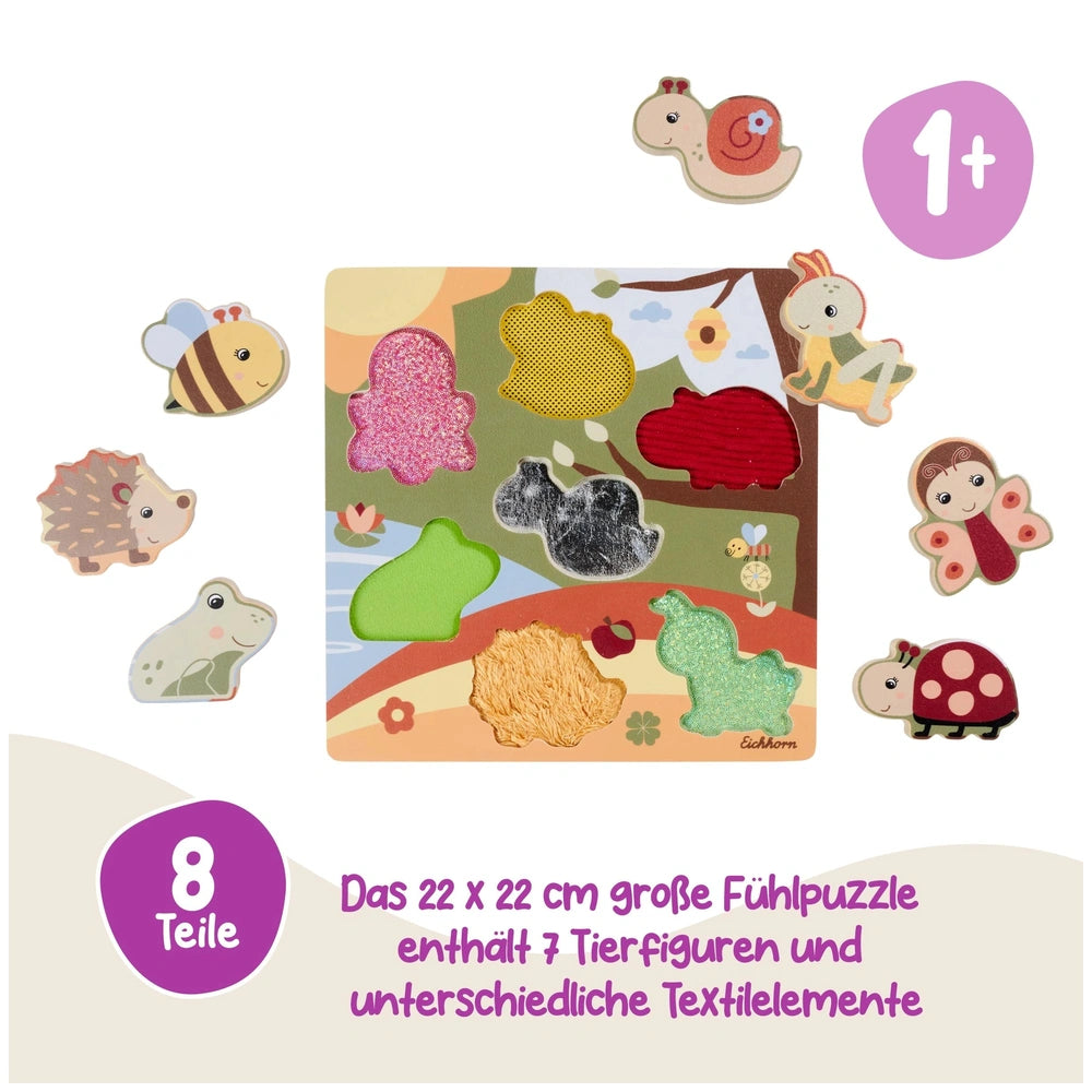 Eichhorn Bee-Happy Sensory Puzzle features vibrant animal stickers scattered on a stylized landscape background.