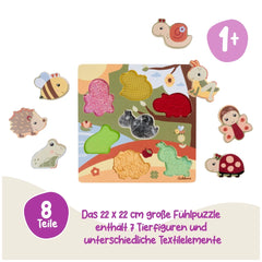 Eichhorn Bee-Happy Sensory Puzzle features vibrant animal stickers scattered on a stylized landscape background.