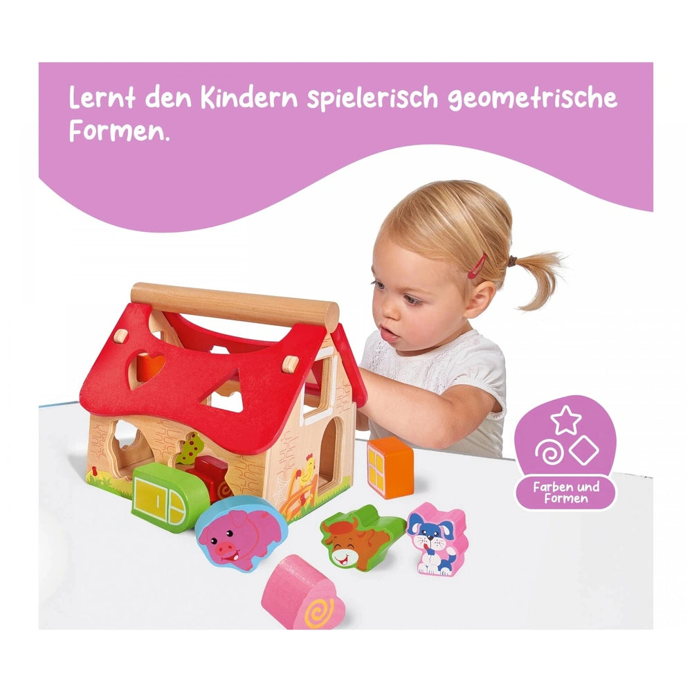 Eichhorn Sorting Farm toy features a toddler engaging with a colorful wooden house and playful animal figures for educational