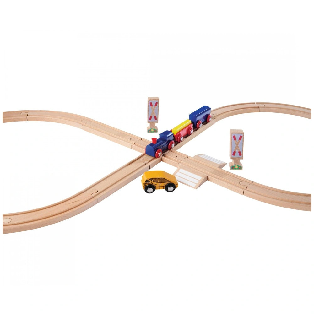 Eichhorn Train Track Playset featuring colorful train cars, wooden track, and platform with truck in a clean white background