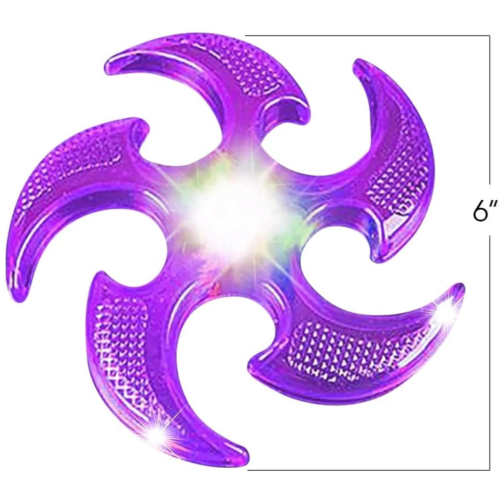Purple glossy plastic Frisby Ninja with central light source creating a starburst effect, designed for outdoor play.