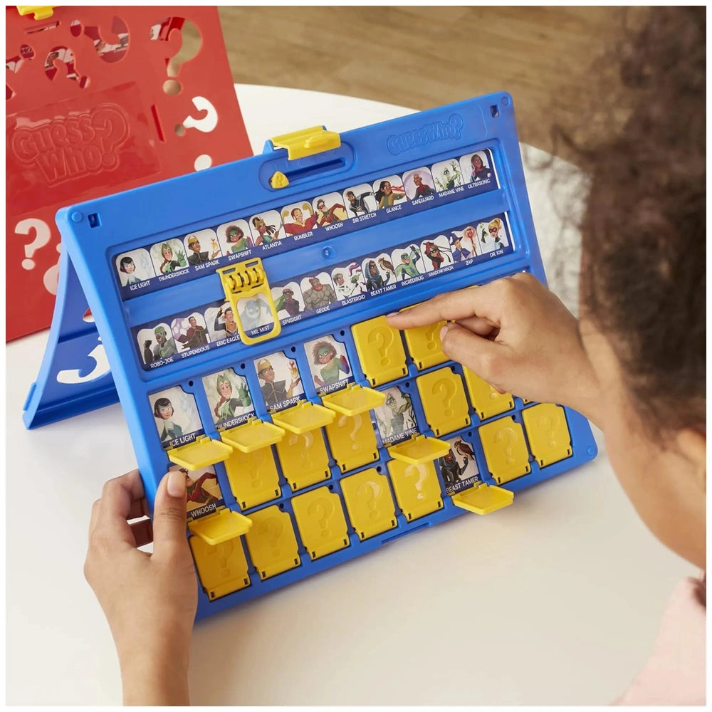 Hasbro Wer Ist Es Board Game in a blue plastic case with yellow buttons, featuring a front view layout.