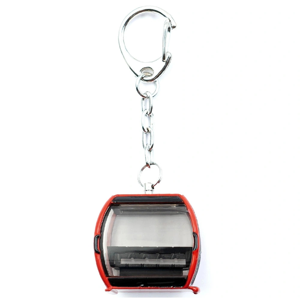 Jagerndorfer Key Chain Omega V Red features a glossy red plastic design with black buttons, levers, and a metal loop.
