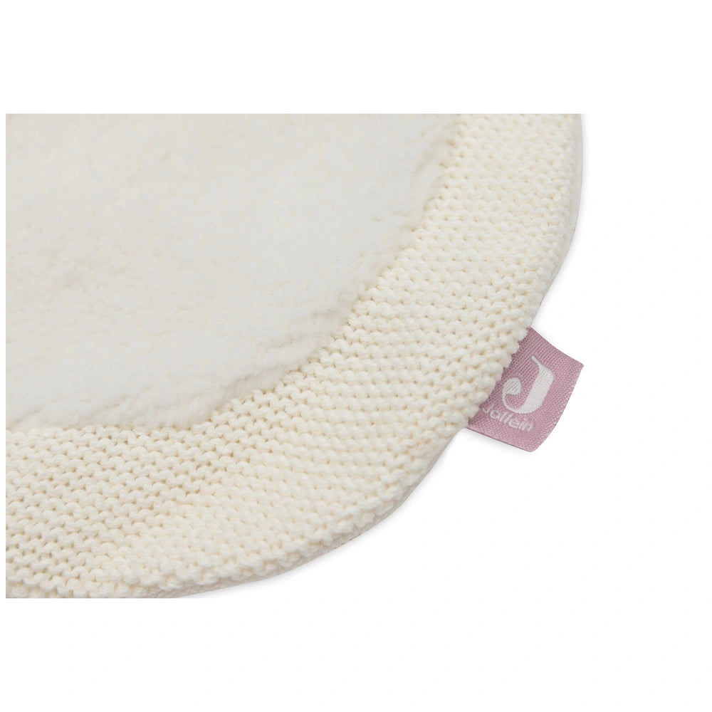 Jollein pacifier cloth in soft light beige knitted fabric with visible seam and partially visible tag reading "JOLIEIN".