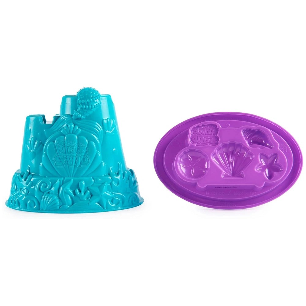 Kinetic Sand Mini Mermaid Lock features a teal object with a crown design and a purple shell-patterned base.