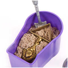 Kinetic Sand Mummy Tomb features a purple container, gold shovel, and brown sand-like material in a close-up layout.